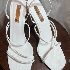 Previously gently worn, White/ ivory size 9 Billini Ophelia Heels. 2 straps